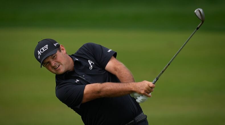 Patrick Reed of the United States plays his second shot on the 3rd hole during the final round of the Dubai Desert Classic in United Arab Emirates, Sunday, Jan. 25, 2026. (AP Photo/Altaf Qadri)