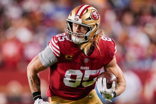 FILE - San Francisco 49ers tight end George Kittle carries the ball during the second half of an NFL football game against the Detroit Lions, Monday, Dec. 30, 2024, in Santa Clara, Calif. (AP Photo/Godofredo A. Vásquez, File)