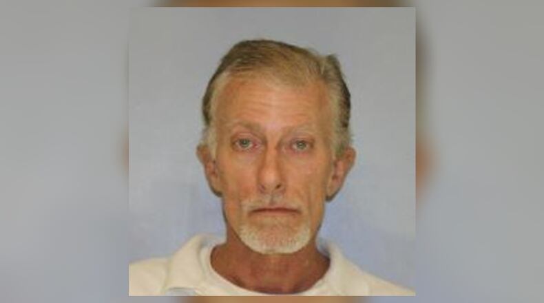 Mitchell George Tostenson, 50, is charged with aggravated assault after Hall County deputies said he intentionally hit a pedestrian with his car.