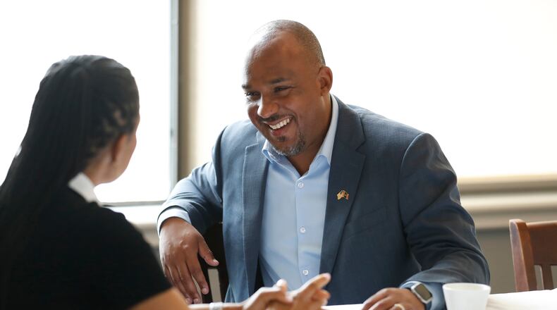 Mississippi Democratic U.S. Senate candidate Scott Colom speaks with Sen. Angela Alsobrooks, D-Md., before a campaign event at the Capital Club in Jackson, Miss., Saturday, Aug. 1, 2026. (AP Photo/Sarah Warnock)