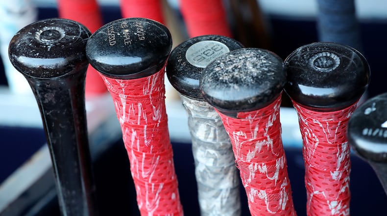 September 20, 2019 Atlanta: The bats of Atlanta Braves Ronald Acuna Jr. are ready in the dugout, the Braves needing the magic number of 1 to clinch the National League East title, as they prepare to play the San Francisco Giants in a MLB baseball game on Friday, Sept. 20, 2019, in Atlanta.  Curtis Compton/ccompton@ajc.com
