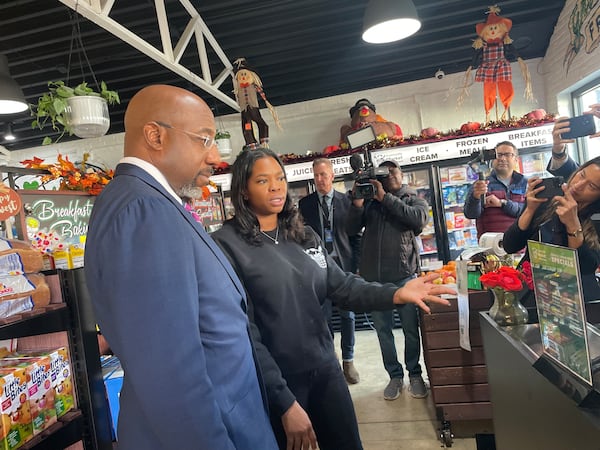U.S. Sen. Raphael Warnock, D-Ga. visited Goodr Community Market in Edgewood on Monday. (Michelle Baruchman/AJC)