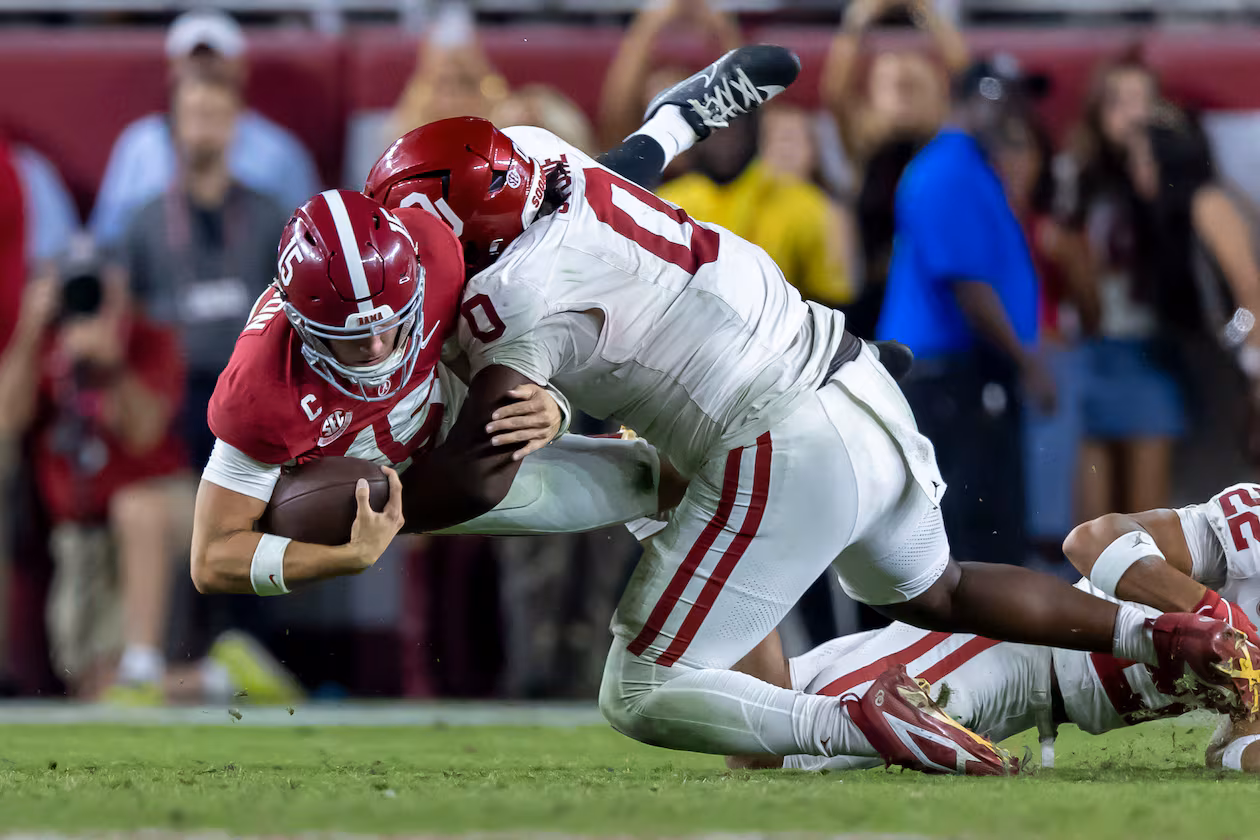 Alabama quarterback Ty Simpson (left) is tackled by Oklahoma defensive tackle David Stone during their game on Saturday, Nov. 15, 2025, in Tuscaloosa, Ala. Oklahoma plays No. 2-ranked Georgia at 3:30 p.m. Saturday. (Vasha Hunt/AP)