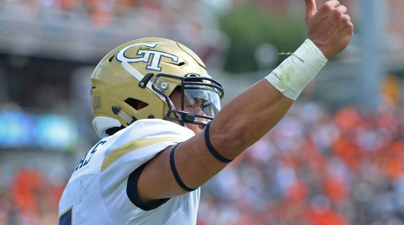 Georgia Tech Yellow Jackets quarterback Justin Thomas (5) celebrates after he scored a touchdown against the Mercer Bears in the first half at Bobby Dodd Stadium on Saturday, September 10, 2016. HYOSUB SHIN / HSHIN@AJC.COM