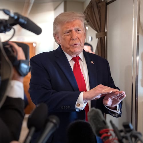 President Donald Trump speaks to reporters aboard Air Force One en route from Joint Base Andrews, Md., to Eau Claire, Wis., Friday, June 5, 2026. (AP Photo/Mark Schiefelbein)
