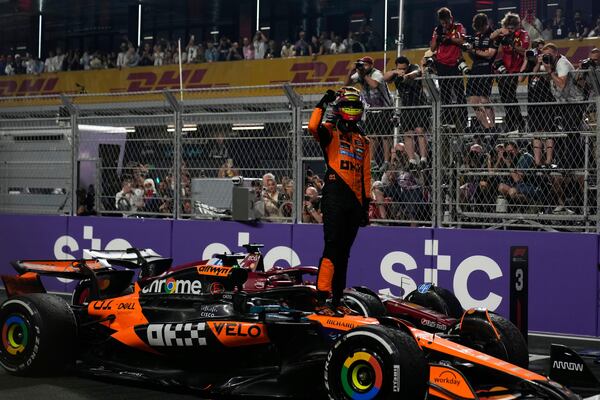 McLaren driver Oscar Piastri of Australia celebrates after winning the Formula One Saudi Arabian Grand Prix at the Jeddah Corniche Circuit in Jeddah, Saudi Arabia, Sunday, April 20, 2025. (AP Photo/Altaf Qadri)