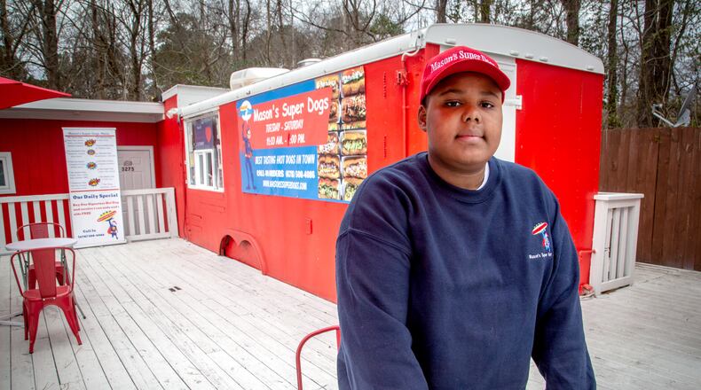 Young entrepreneur Mason Wright opened his Stonecrest restaurant, Mason's Super Dogs in October.  Steve Schaefer for The AJC