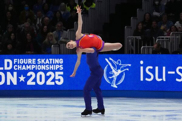 Caroline Green and Michael Parsons, of the United States, perform during the ice dance rhythm dance program at the figure skating world championships, Friday, March 28, 2025, in Boston. (AP Photo/Charles Krupa)