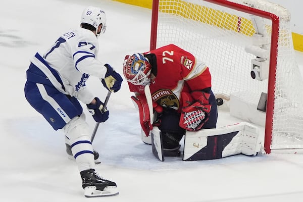 Toronto Maple Leafs left wing Max Pacioretty (67) scores a goal past Florida Panthers goaltender Sergei Bobrovsky (72) during the third period in Game 6 of a second-round NHL hockey playoff series, Friday, May 16, 2025, in Sunrise, Fla. (AP Photo/Lynne Sladky)