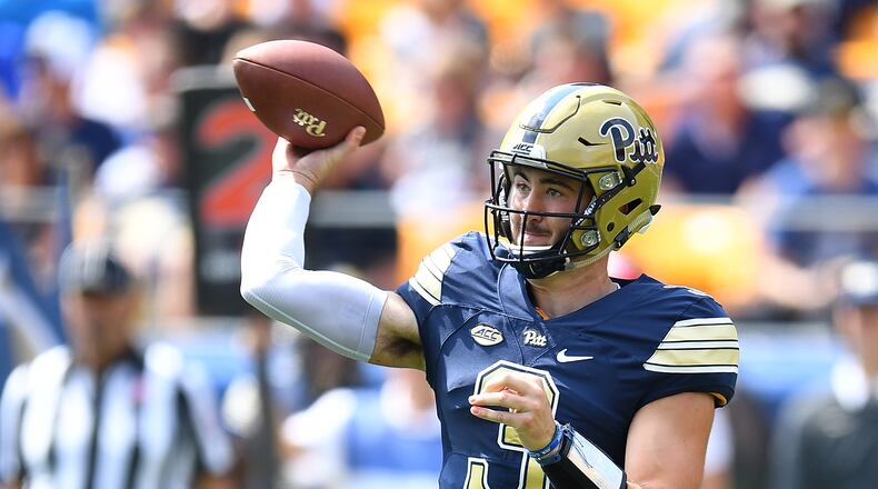 Ben Dinucci of the Pittsburgh Panthers looks to pass during the second quarter against the Oklahoma State Cowboys at Heinz Field on September 16, 2017 in Pittsburgh, Pennsylvania. (Photo by Joe Sargent/Getty Images)