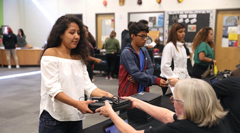 State Farm awarded DeKalb County School District with $100,000 and 1,200 laptops for their college and career preparedness initialtive.
