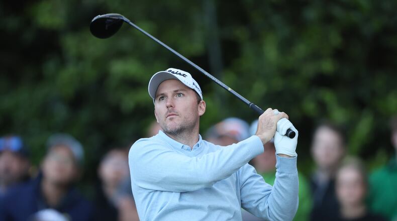 Russell Henley tees off on 14th hole during final round of the 2023 Masters Tournament at Augusta National Golf Club, Sunday, April 9, 2023, in Augusta, Ga. (Jason Getz / Jason.Getz@ajc.com)