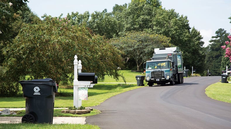 Peachtree City wants to reduce road damage by limiting the number of heavy trash trucks on its streets. Courtesy Waste Industries