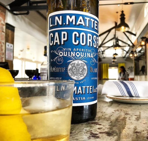 At Scout in Oakhurst, the Mattei Cap Corse Blanc comes simply adorned with lemon peel. Photo: Brad Kaplan