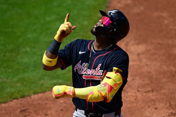 Braves outfielder Ronald Acuña Jr. celebrates a Sunday afternoon single in Cleveland.