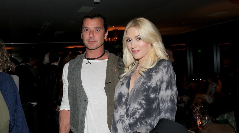 WEST HOLLYWOOD, CA - NOVEMBER 30: Musicians Gavin Rossdale (L) and Gwen Stefani attend PANDORA Jewelry and Moto X present 'American Hustle' at cinema prive at on November 30, 2013 in West Hollywood, California. (Photo by Rich Polk/Getty Images for cinema prive)