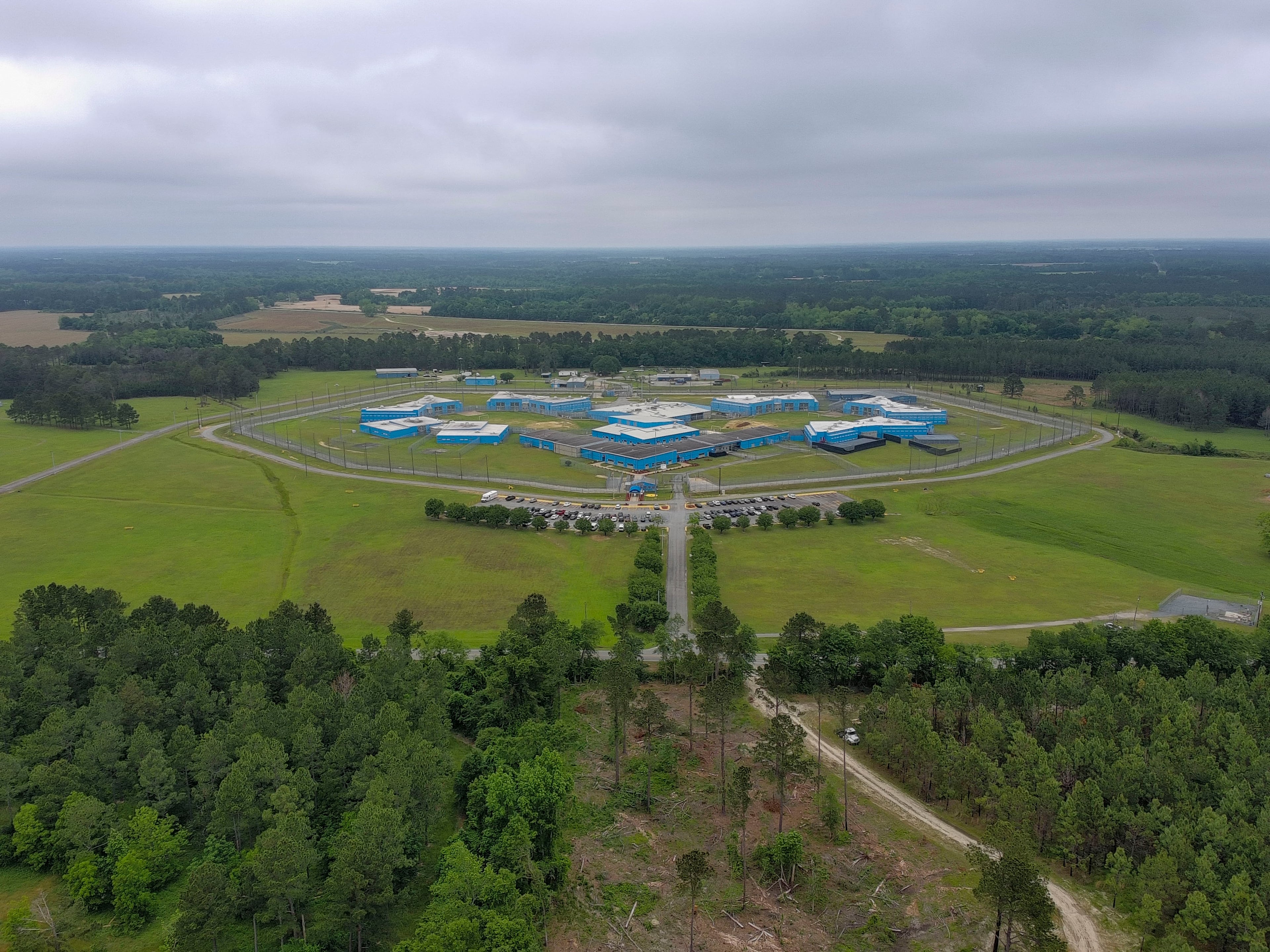 The remoteness of Calhoun State Prison, located in a sparsely populated rural county of 4,300 residents, has made the facility attractive to smugglers of drugs, cellphones and other forms of contraband into the prison. (Miguel Martinez/AJC)