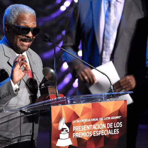 FILE - Rafael Ithier of El Gran Combo de Puerto Rico accepts the Lifetime Achievement Award at the Lifetime Achievement and Trustees Awards presentation at the Ka Theater in the MGM Grand Hotel on Wednesday, Nov. 18, 2015, in Las Vegas. (Photo by Chris Pizzello/Invision/AP, File)
