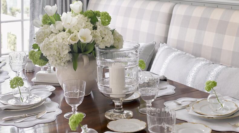 In the Southeastern Designer Showhouse & Gardens in Buckhead, DeLoach worked with Atlanta-based Design Galleria on the kitchen. In the breakfast room, which DeLoach designed, the shelves were painted Farrow & Ball “Light Blue” and serve as a backdrop for a collection of antique creamware. She also used antique furniture layered with subtle tones of blue and cream and Cowtan & Tout fabrics. The nailhead panel was designed by DeLoach and executed by Bjork Studio in Atlanta. Contributed by David Christensen for Southeastern Showhouse