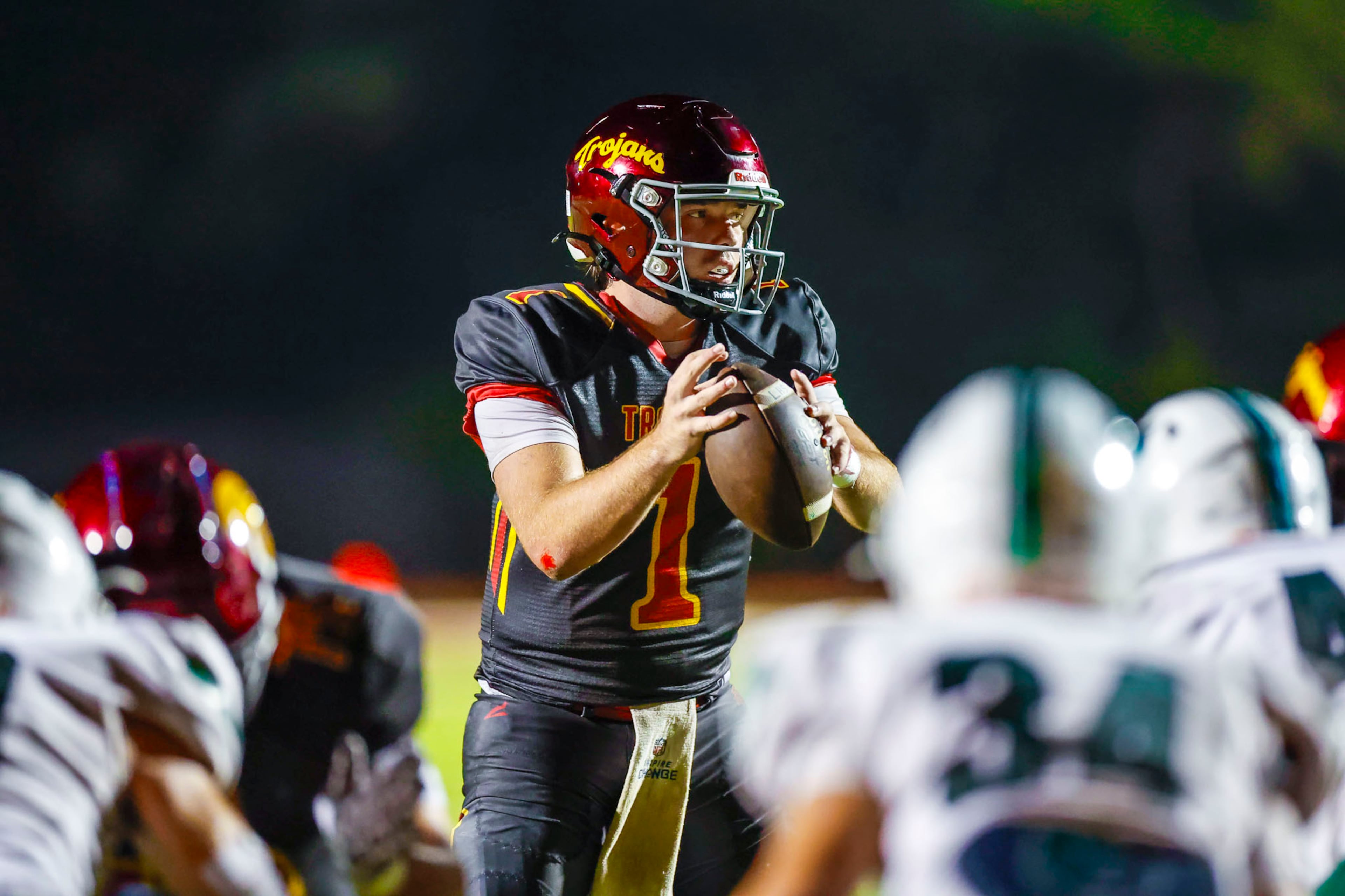 Lassiter quarterback Mitch Seaman (#1) looks for a pass during the second half against Creekview at Lassiter High School in Marietta, GA on Friday, Sept. 5, 2025. (Oscar Guevara Saenz/For the Atlanta Journal Constitution)