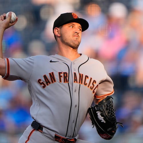 San Francisco Giants starting pitcher Tyler Mahle throws during the first inning of a baseball game against the Kansas City Royals, Tuesday, July 21, 2026, in Kansas City, Mo. (AP Photo/Charlie Riedel)