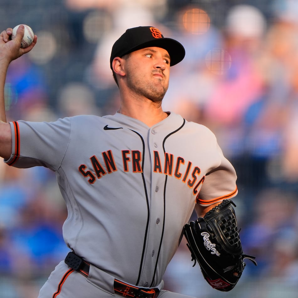San Francisco Giants starting pitcher Tyler Mahle throws during the first inning of a baseball game against the Kansas City Royals, Tuesday, July 21, 2026, in Kansas City, Mo. (AP Photo/Charlie Riedel)