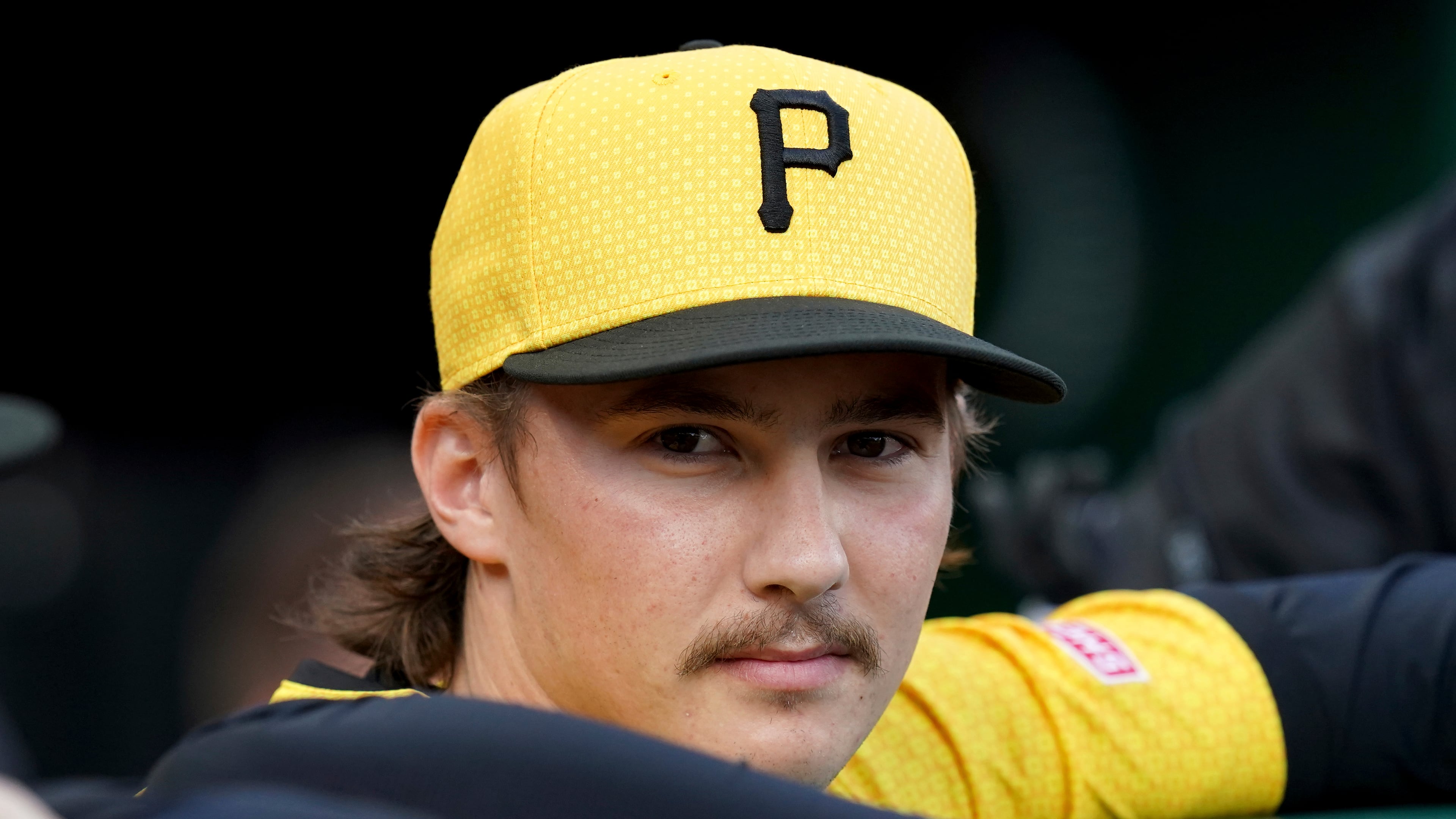 Pirates pitcher Bubba Chandler stands in the dugout before making his MLB debut against the Colorado Rockies on Friday, Aug. 22, 2025, in Pittsburgh. Chandler pitched four shutout innings, allowing just two hits and no walks with three strikeouts. (Matt Freed/AP)