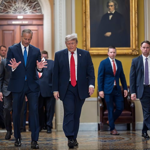 President Donald Trump, escorted by Senate Majority Leader John Thune, R-S.D., heads to a meeting with Senate Republicans at the Capitol in Washington, Wednesday, June 24, 2026. (AP Photo/J. Scott Applewhite)