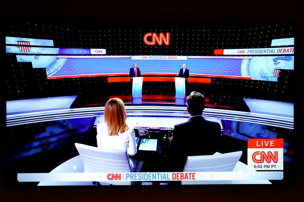 The first 2024 presidential debate is seen on TV between President Joe Biden and Republican presidential candidate and former President Donald Trump.