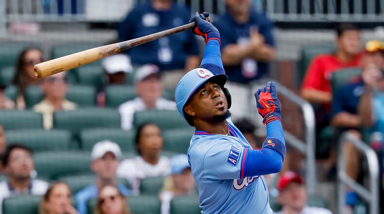 Atlanta Braves' Ozzie Albies watches his winning two-run home run against the Milwaukee Brewers during the ninth inning of a baseball game, Saturday, June 20, 2026, in Atlanta. (AP Photo/Erik S. Lesser)