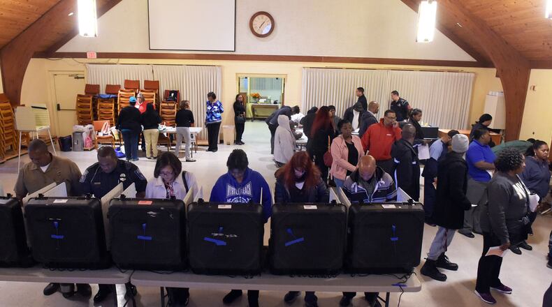 DeKalb County voters went to the polls on Election Day at the Crossroads Presbyterian Church on Tuesday. KENT D. JOHNSON / KDJOHNSON@AJC.com