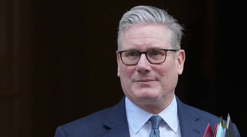 Britain's Prime Minister Keir Starmer leaves 10 Downing Street to attend the weekly Prime Ministers' Questions session in parliament in London, Wednesday, Feb. 25, 2026. (AP Photo/Kin Cheung)