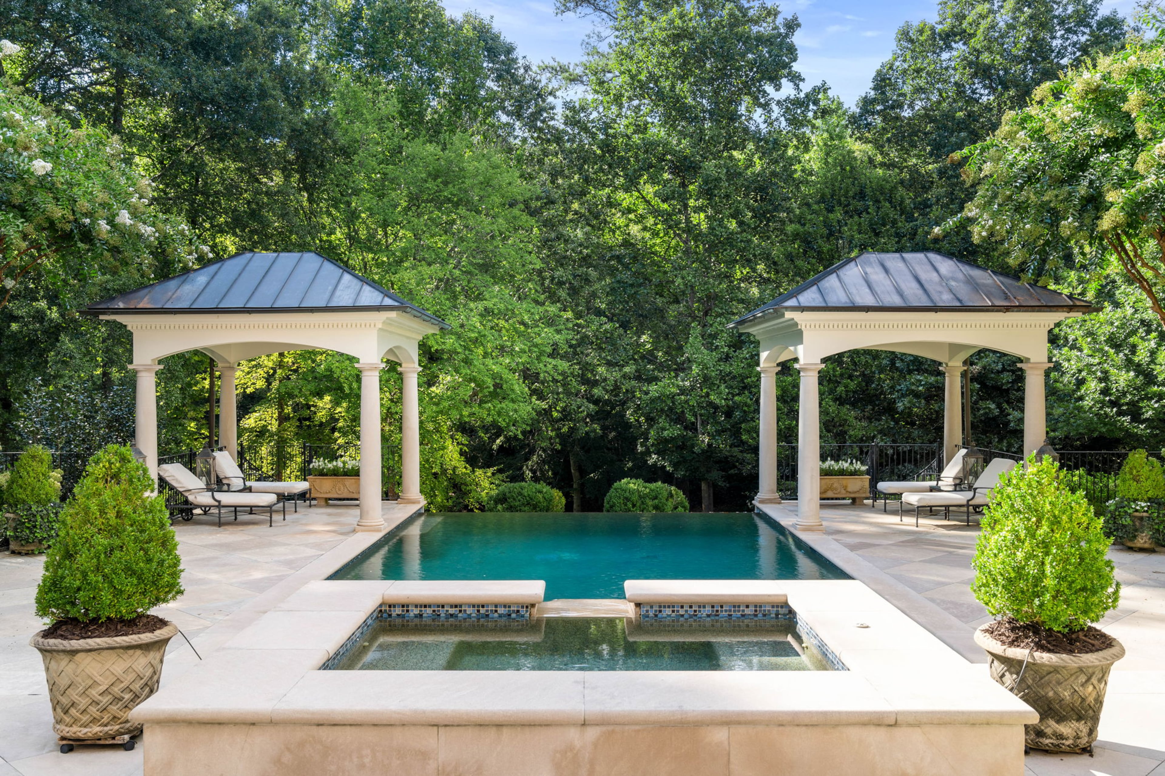 Sold for $12,865,000, the Buckhead property features over 14,000 square feet of living space in the main house alone.
