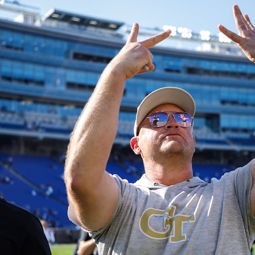 Georgia Tech coach Brent Key holds up seven fingers signifying the Yellow Jackets' 7-0 start following their 27-18 win over Duke on Saturday, Oct. 18, 2025, in Durham, N.C. (Ben McKeown/AP)
