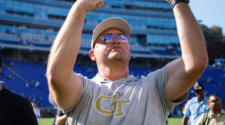 Georgia Tech coach Brent Key holds up seven fingers signifying the Yellow Jackets' 7-0 start following their 27-18 win over Duke on Saturday, Oct. 18, 2025, in Durham, N.C. (Ben McKeown/AP)