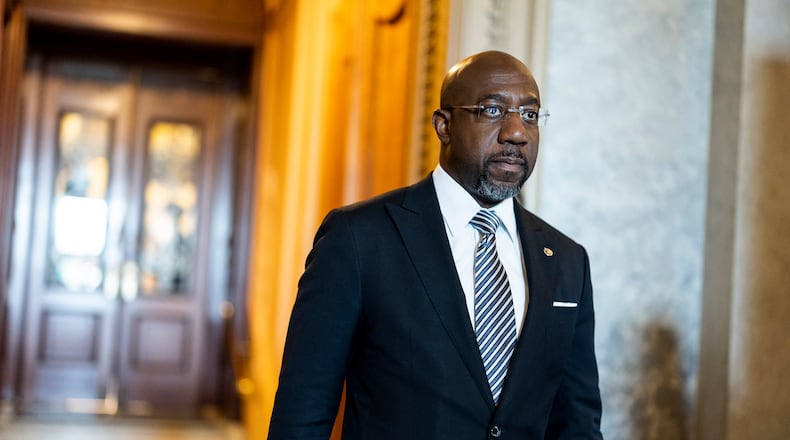 U.S. Sen. Raphael Warnock took a pay cut in 2021 for his work as senior pastor at Ebenezer Baptist Church, receiving $120,964.59 in salary and benefits. He received about $200,000 in 2020, the year before he entered the Senate. There are rules about how much senators can earn outside their government salary of $174,000 a year. (Anna Moneymaker/Getty Images/TNS)