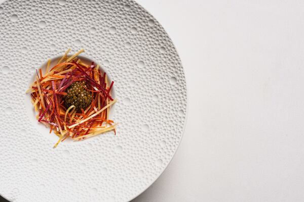 Kristal caviar, served on root vegetable "confetti," kicked off the tasting menu at Atlas in December. Courtesy of Atlas 