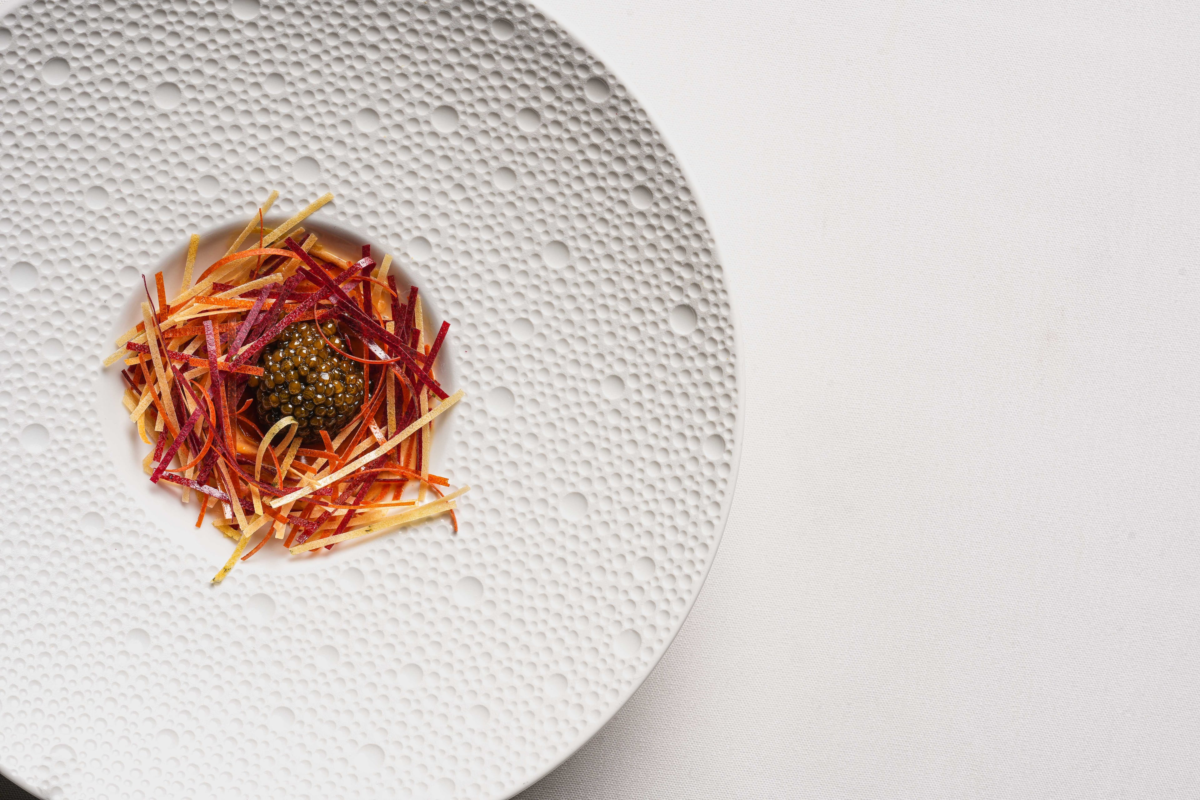 Kristal caviar with root vegetable "confetti" kicked off the tasting menu at Atlas in December 2023.(Courtesy of Atlas)