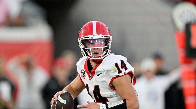 Georgia quarterback Gunner Stockton (14) prepares to get off a pass during the second half in an NCAA football game, Saturday, November 1, 2025, Jacksonville, Fla. Georgia won 24-20 over Florida. (Hyosub Shin / AJC)