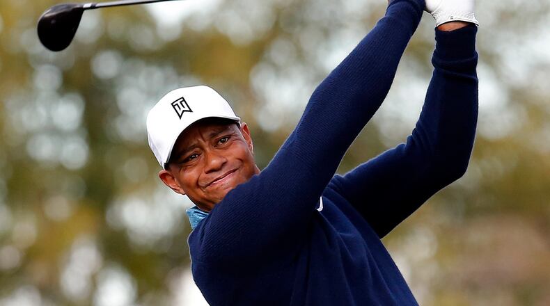 Tiger Woods hits a tee shot on the ninth hole during a practice round for to the Phoenix Open golf tournament on Tuesday, Jan. 27, 2015, in Scottsdale, Ariz. (AP Photo/Rick Scuteri) Tiger Woods is playing his second practice round in Augusta today. (AP photo)