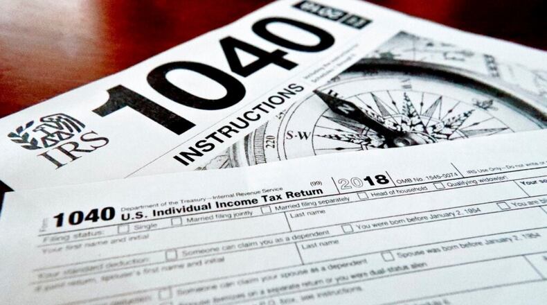 A man who had been living in Atlanta illegally was sentenced to four years and nine months in prison for fraudulently filing tax returns using stolen identities, U.S. Attorney B.J. Pak said in a news release. (AP Photo/Keith Srakocic, File)