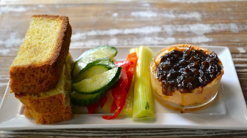 The pimento cheese, topped with a syrupy bacon jam, comes with veggies and toasted house-made gluten-free bread. JENNY TURKNETT / SPECIAL