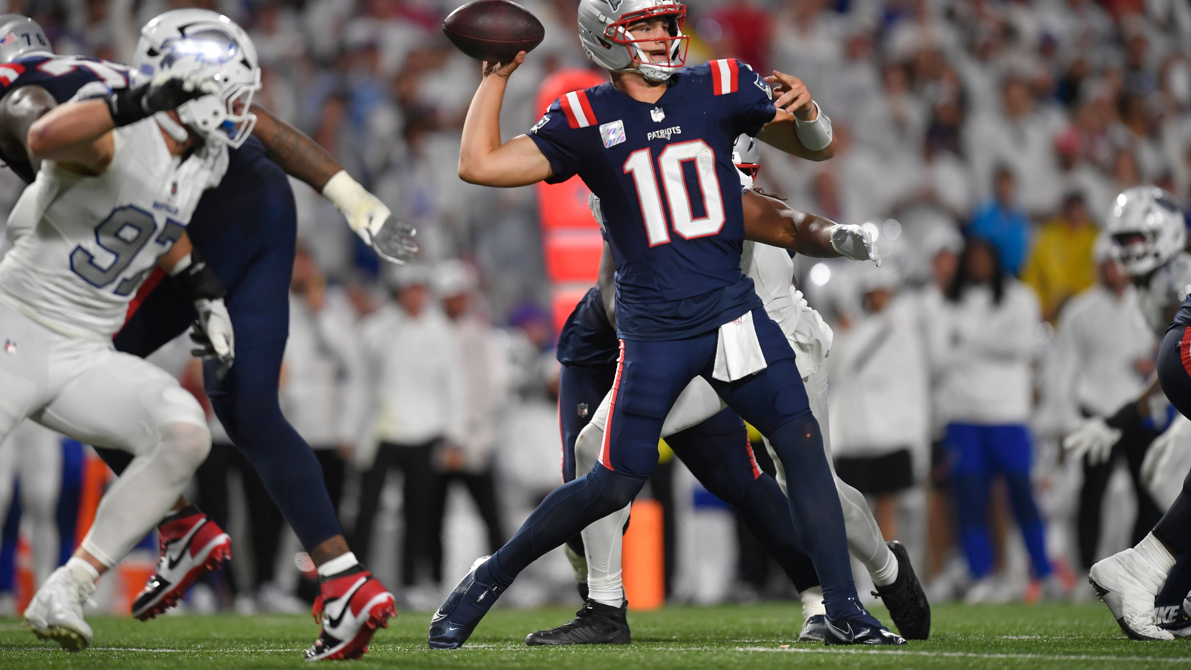 New England Patriots quarterback Drake Maye (10) throws against the Buffalo Bills during the second half of an NFL football game, Sunday, Sept. 5, 2025, in Orchard Park, N.Y. (AP Photo/Adrian Kraus)