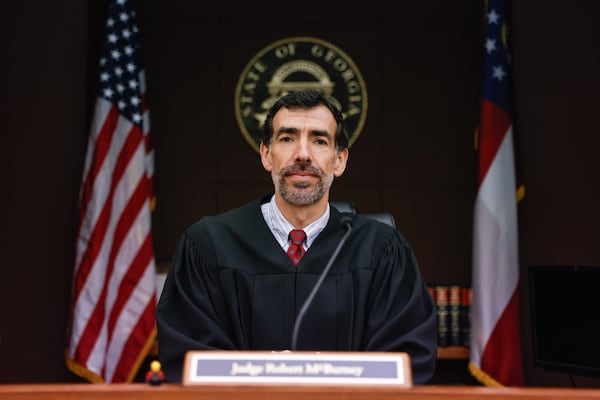 Judge Robert McBurney poses for a portrait in his courtroom at Fulton County Courthouse in Atlanta on June 13, 2024. (Natrice Miller/AJC)