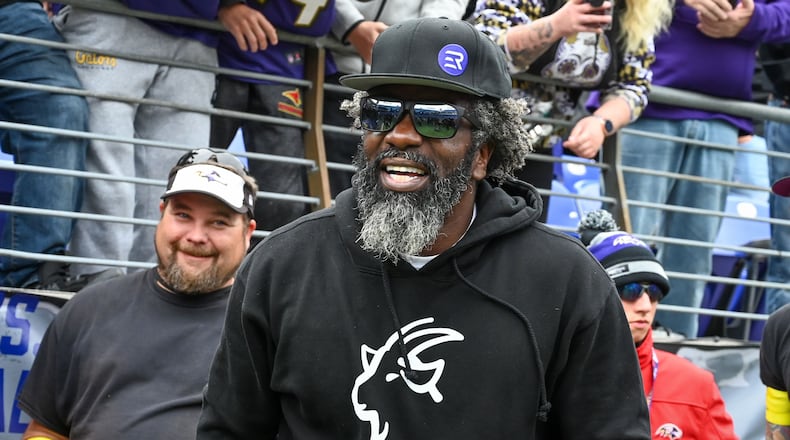 Ed Reed talks to fans on the sideline before the Ravens' game against the Browns on Oct. 23 at M&T Bank Stadium. (Jerry Jackson/Baltimore Sun/TNS)