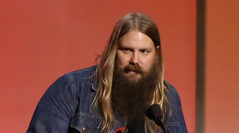Chris Stapleton picks up his first-ever Grammy. Photo: AP.