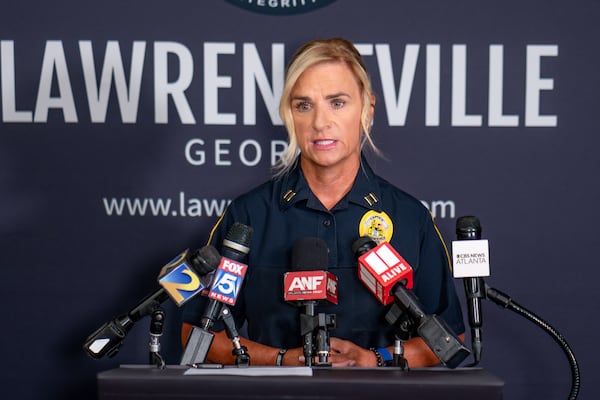 Lawrenceville police spokesperson Capt. Dena Pauly speaks to reporters on Thursday, July 30, 2026, about the death of a 1-year-old boy who police said was left in a hot car the day before. (Ben Hendren for the AJC)