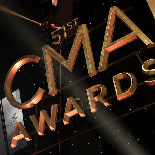 FILE - Signage for the 51st annual CMA Awards appears at the Bridgestone Arena on Nov. 8, 2017, in Nashville, Tenn. (Photo by Chris Pizzello/Invision/AP, File)