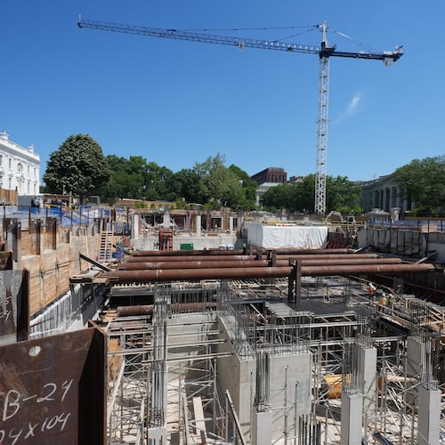 The Ballroom construction site can be seen as President Donald Trump tours the area at the White House, Tuesday, May 19, 2026, in Washington. (AP Photo/Jacquelyn Martin)