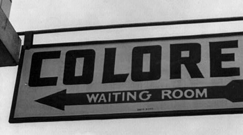 Sign at the Greyhound bus station in Rome, Ga., in 1943. (Library of Congress)
